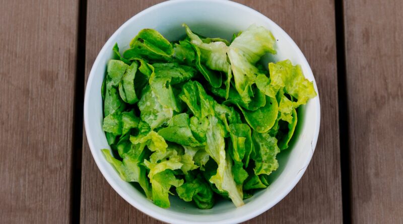 green vegetable in white bowl